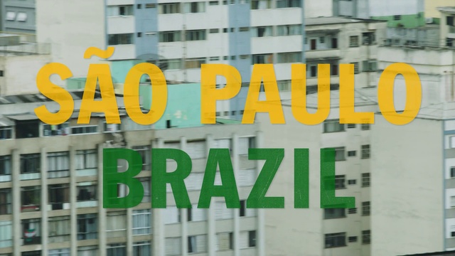 Video Reference: Font, Green, Text, Property, Yellow, Architecture, Real estate, Building, Metropolitan area, Design