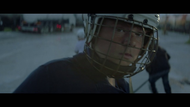 Video Reference: Helmet, Sports gear, Hockey protective equipment, Personal protective equipment, Goaltender mask, Mask, Headgear, Costume, Photography, Ice hockey