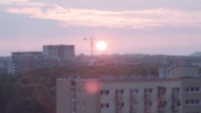 Video Reference: Sky, Atmospheric phenomenon, Morning, Cloud, Horizon, Urban area, Sunrise, Sun, City, Atmosphere