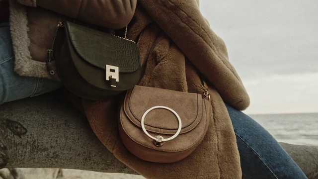 Video Reference: Beige, Hand, Bag, Leather, Fashion accessory, Shoe