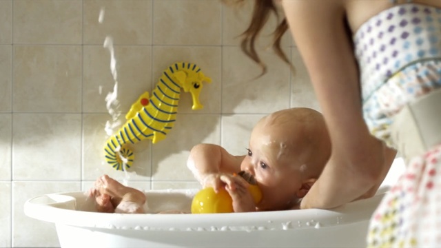 Video Reference: Child, Caterpillar, Product, Yellow, Toddler, Baby, Organism, Play, Room, Bathing