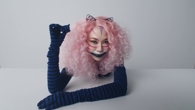 Video Reference: Hair, Pink, Blue, Head, Wig, Lip, Fur, Textile, Mouth, Art