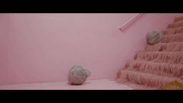 Video Reference: pink, photograph, skin, room, nose, wall, bed, product, textile, floor