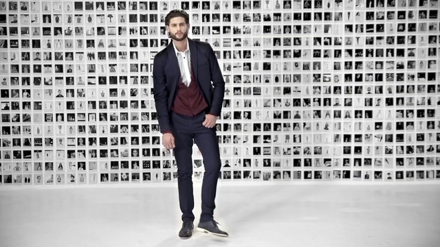 Video Reference: Clothing, Fashion, Standing, Outerwear, Suit, Jeans, Blazer, Denim, Footwear, Fashion design