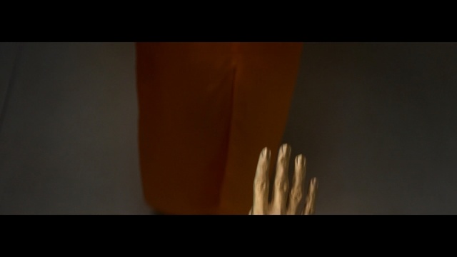 Video Reference: black, light, orange, darkness, lighting, arm, heat, hand, finger, mouth