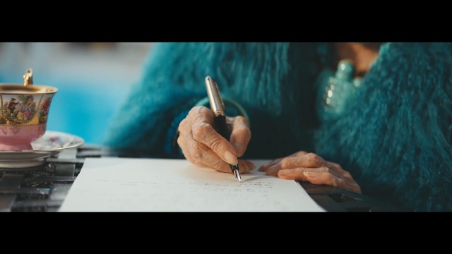 Video Reference: Hand, Turquoise, Writing instrument accessory, Finger, Human, Writing, Adaptation, Photography, Art, Person
