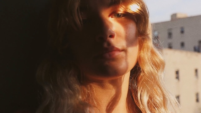 Video Reference: Hair, Face, Lip, Nose, Hairstyle, Blond, Head, Beauty, Chin, Brown hair, Person