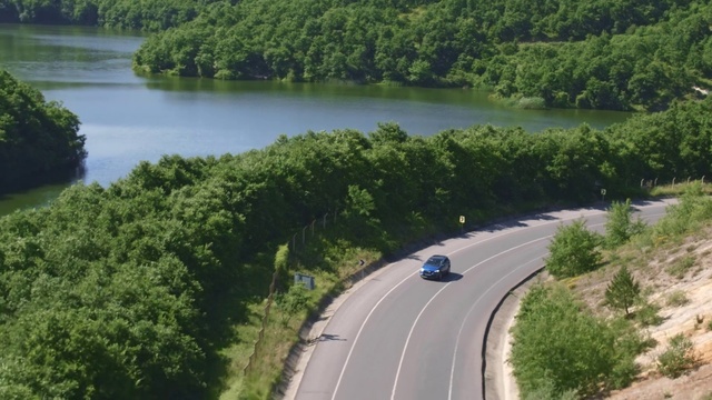 Video Reference: Aerial photography, Water resources, Road, Thoroughfare, Natural landscape, River, Water, Birds-eye view, Waterway, Bank