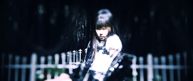 Video Reference: Black hair, Performance, Fashion, Lip, Darkness, Photography, Musician, Pop music, Plant, Night, Front, Black, Young, Woman, Fence, Holding, Girl, Man, Riding, White, Standing, Person, Human face, Clothing, Concert