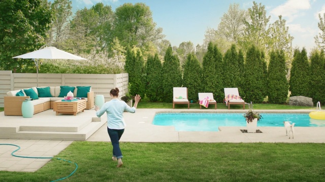 Video Reference: leisure, swimming pool, property, backyard, grass, plant, water, yard, lawn, recreation, Person