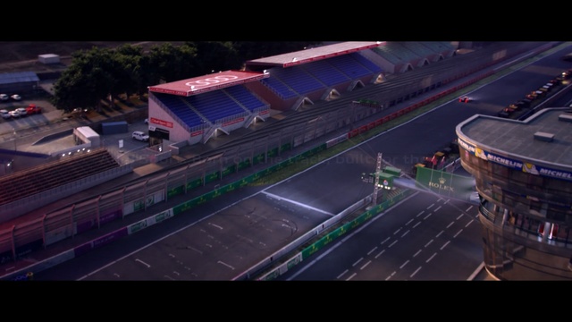 Video Reference: urban area, mode of transport, structure, car, race track, night, sport venue, metropolitan area, aerial photography, sky