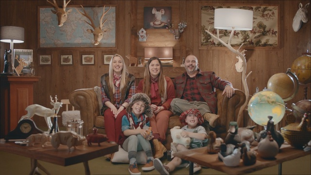 Video Reference: sofa, family, man, woman, children, girl, boy, room, home, fun, smile, Person