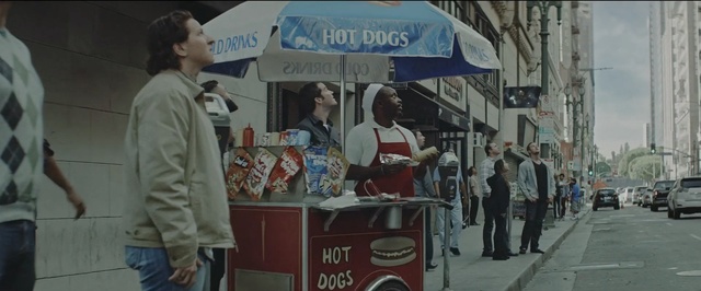 Video Reference: street, advertising, vehicle, pedestrian, car, road, city, Person