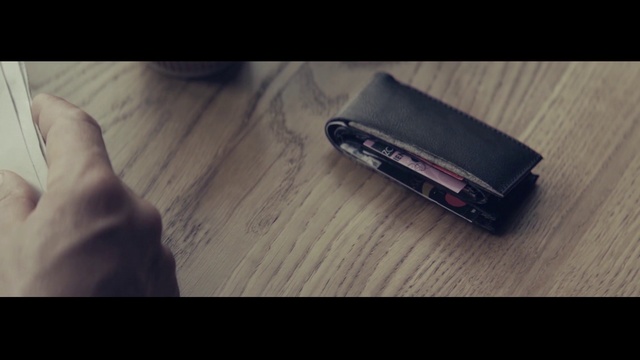 Video Reference: Hand, Wallet, Harmonica, Material property, Leather, Photography, Finger, Fashion accessory