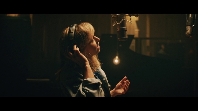 Video Reference: Photograph, Darkness, Performance, Photography, Human body, Performance art, Hand, Microphone, Audio equipment, Flash photography