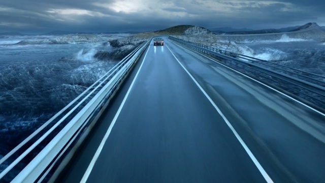 Video Reference: road, highway, infrastructure, sky, fixed link, horizon, atmosphere, daytime, line, water