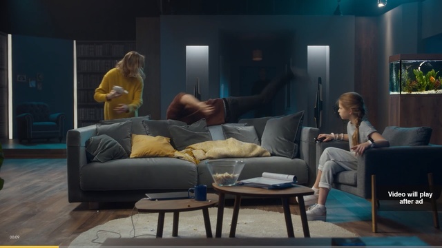 Video Reference: Living room, Couch, Room, Blue, Furniture, Interior design, Table, House, Comfort, Home