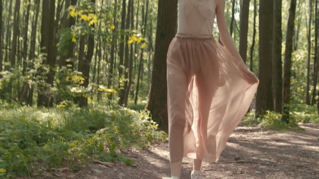 Video Reference: trunk, tree, grass, abdomen, trousers, forest, girl, jeans, trail, woodland