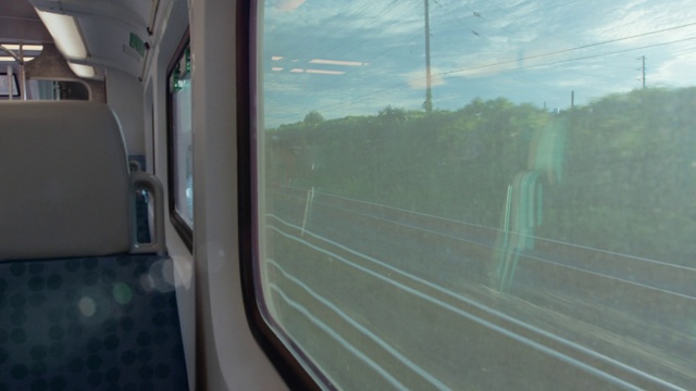 Video Reference: Transport, Mode of transport, Atmospheric phenomenon, Vehicle, Glass, Sky, Train, Tree, Road, Window