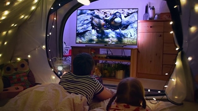 Video Reference: Television, Purple, Interior design, Television set, Entertainment, Display device, Technology, Electronic device, Space, Comfort