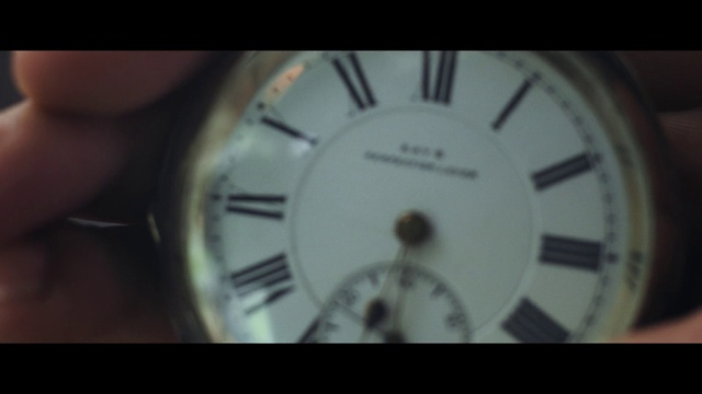 Video Reference: Watch, Clock, Font, Circle, Darkness, Number, Analog watch, Fashion accessory, Brand, Symmetry