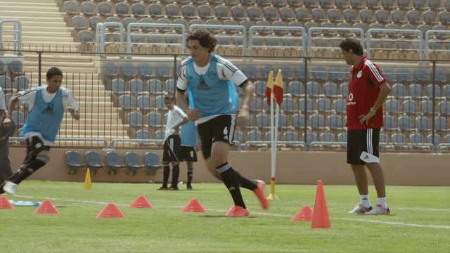 Video Reference: sport venue, sports, player, football player, team, stadium, public space, soccer player, team sport, tournament, Person