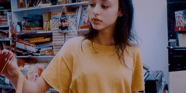 Video Reference: Hair, Arm, Lip, Neck, Mouth, Chest, T-shirt, Long hair, Jaw, Black hair