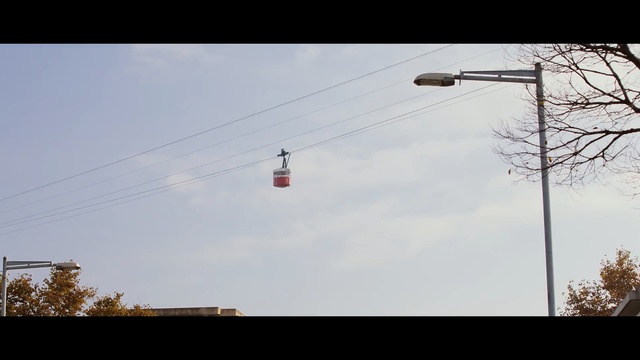 Video Reference: Sky, Overhead power line, Cloud, Daytime, Lighting, Tree, Line, signaling device, Traffic light, Light fixture