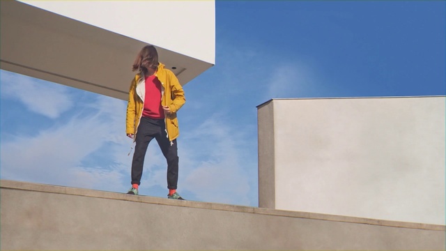 Video Reference: Blue, Yellow, Standing, Fashion, Wall, World, Trousers, Art, Person, Woman, Man, Young, Board, Holding, Girl, Riding, Boy, Sign, Ramp, Jumping, Large, Air, Table, Flying, White, Snow, Slope, Doing, Clothing, Sky, Footwear, Text, Jeans