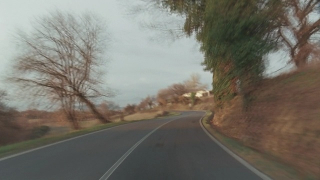 Video Reference: road, lane, highway, sky, asphalt, infrastructure, tree, road trip, mode of transport, car