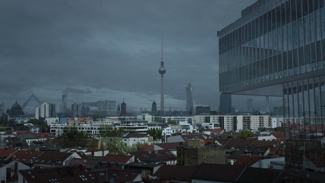 Video Reference: Cloud, Building, Sky, Atmosphere, Daytime, Skyscraper, Tower, Window, Tower block, Cityscape