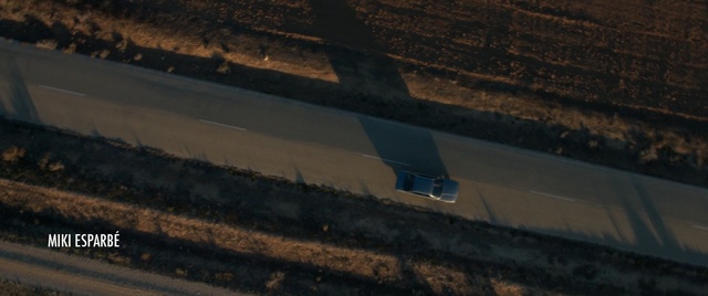 Video Reference: Asphalt, Line, Road, Road surface, Mode of transport, Roof, Infrastructure, Sky, Automotive exterior, Wood