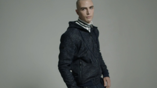 Video Reference: suit, garment, clothing, jacket, business, person, man, handsome, male, portrait, adult, businessman