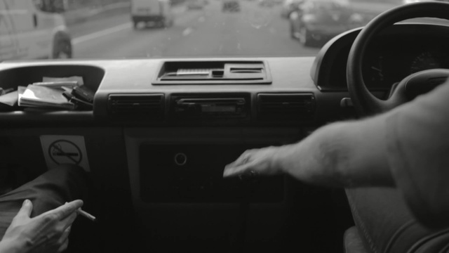 Video Reference: car, vehicle, motor vehicle, steering wheel, automotive design, technology, photography, personal luxury car, driving, black and white