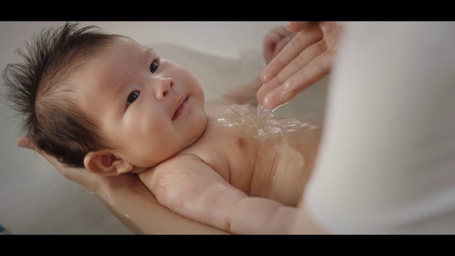 Video Reference: Child, Face, Bathing, Skin, Baby, Cheek, Nose, Eyebrow, Head, Lip
