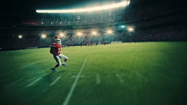 Video Reference: Sport venue, Player, Football player, Stadium, Football, Sky, Soccer-specific stadium, Atmosphere, Grass, Team sport, Ball, Field, Game, Baseball, Playing, Green, Soccer, Young, Ready, Man, Holding, Red, Standing, Throwing, Wearing, Swinging, Night, Large, Air, Pitch, Bat, Sports equipment, Person