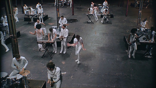 Video Reference: stage, performance, recreation, crowd, musical instrument accessory, musician, performance art, performing arts, musical ensemble, Person