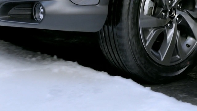 Video Reference: motor vehicle, tire, car, automotive tire, wheel, alloy wheel, rim, automotive design, automotive exterior, vehicle, Person