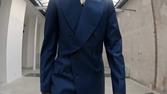 Video Reference: Suit, Clothing, Outerwear, Formal wear, Blazer, Tuxedo, Jacket, Coat, Overcoat, Pantsuit