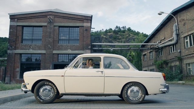 Video Reference: car, motor vehicle, vehicle, family car, classic car, automotive design, volkswagen type 3, compact car, notchback, classic, Person