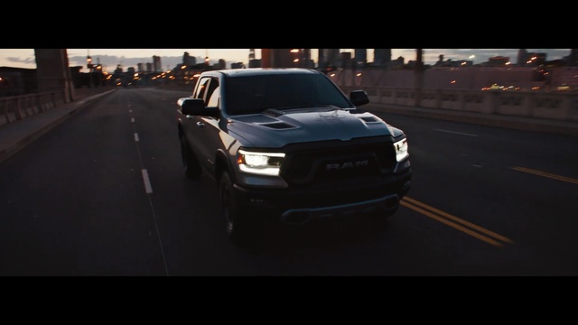 Video Reference: car, motor vehicle, vehicle, automotive design, road, light, luxury vehicle, reflection, automotive exterior, automotive lighting