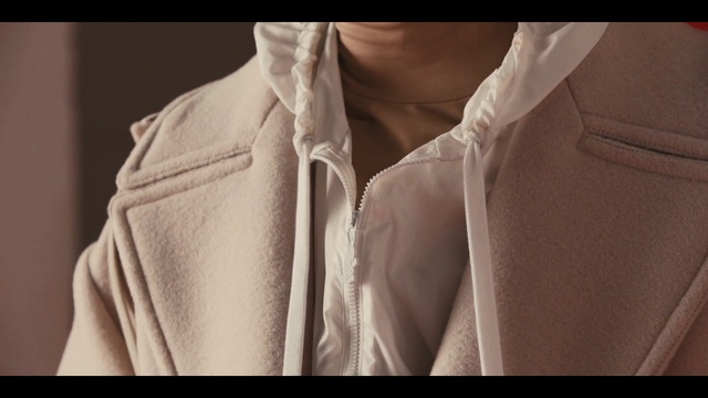 Video Reference: Clothing, Outerwear, Shoulder, Jacket, Fashion, Robe, Neck, Sleeve, Shirt, Beige