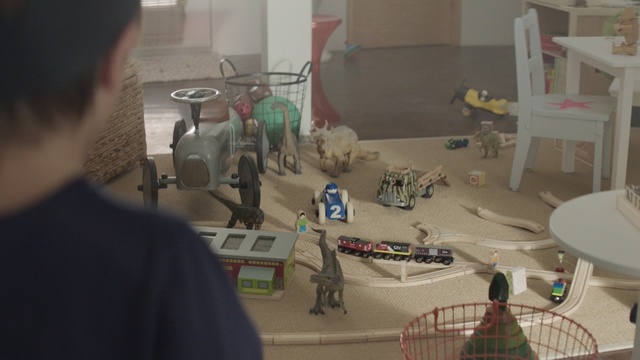 Video Reference: children, fun, room, toy, toys, light, boy, car, toy car , Person