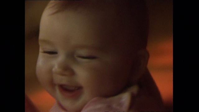 Video Reference: Child, Face, Cheek, Nose, Baby, Skin, Lip, Facial expression, Chin, Forehead