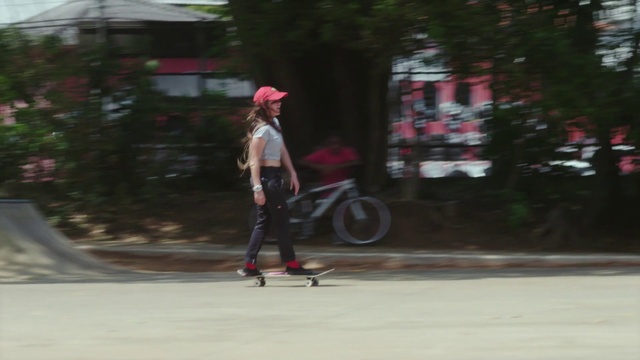 Video Reference: Sports equipment, Recreation, Tree, Vehicle, Bicycle, Footwear, Headgear, Road, Street, Longboard