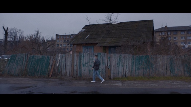 Video Reference: sky, wall, urban area, house, morning, screenshot, residential area, shack, area, facade