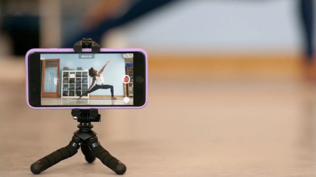 Video Reference: camera accessory, cameras & optics, photography, product, technology, gadget, tripod, product, camera, videographer, Person