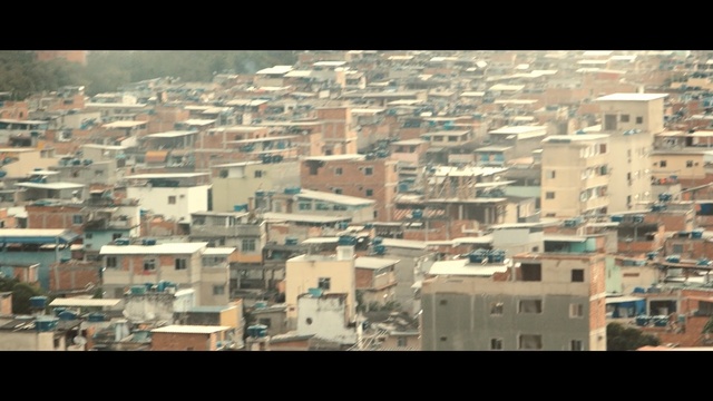 Video Reference: Urban area, Residential area, Metropolitan area, Suburb, City, Metropolis, Neighbourhood, Human settlement, Cityscape, Daytime