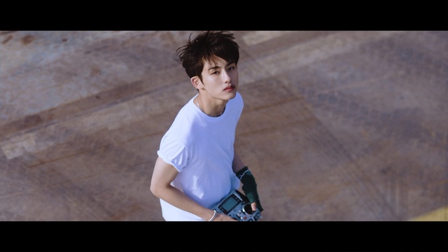 Video Reference: Photograph, Shoulder, Arm, Sitting, Snapshot, Joint, Cool, Leg, Photography, Elbow, Person, Game, Sport, Young, Boy, Man, Riding, Racket, Board, Holding, Shirt, Male, Ramp, Doing, Using, Trick, Playing, Ball, Standing, Court, Woman, White, Swinging, Player, Clothing, Human face, Athletic game, Trousers