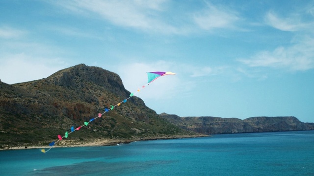 Video Reference: Sky, Sea, Ocean, Coast, Coastal and oceanic landforms, Vacation, Fun, Beach, Kite sports, Wind